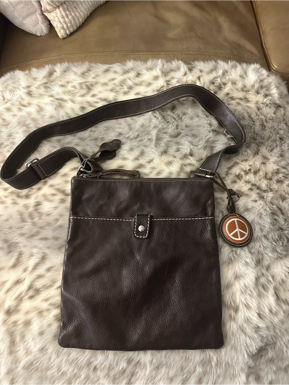 Roots Dark Brown Leather Crossbody Bag with Peace Charm